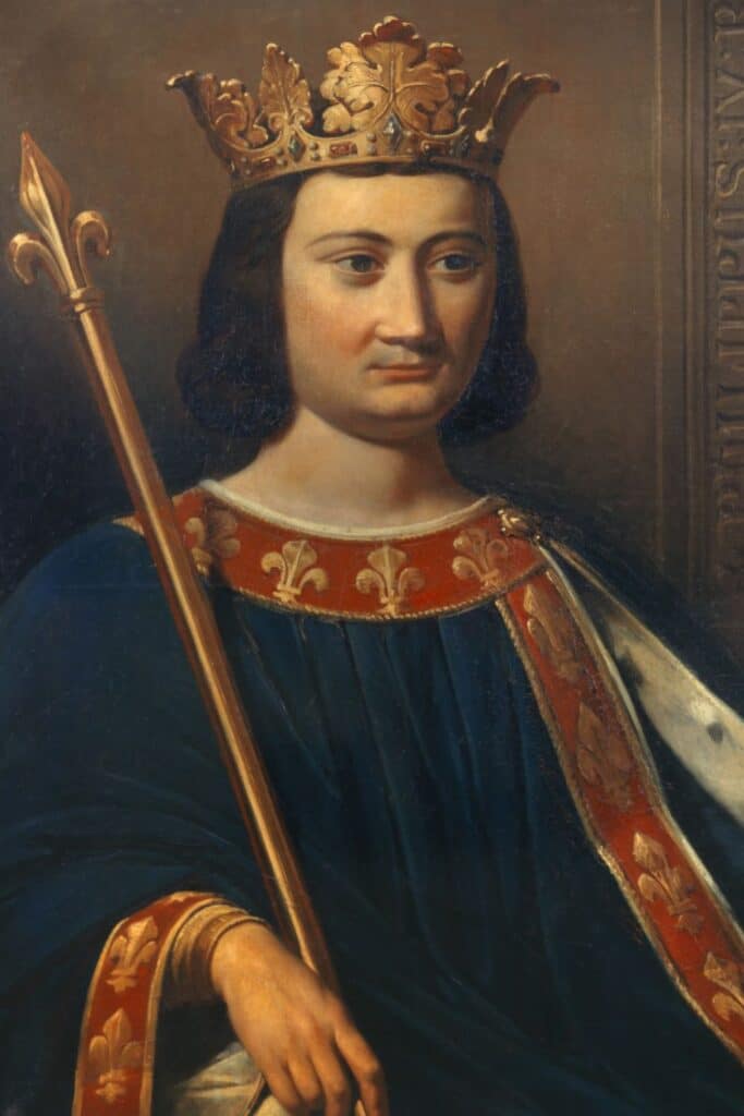 A regal portrait of King Philip IV of France, also known as Philip the Fair, wearing a golden crown adorned with fleur-de-lis and holding a scepter. His solemn expression and richly detailed royal robes highlight the authority and grandeur of the Capetian dynasty during one of its most powerful reigns.