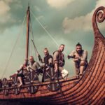 A group of Viking warriors in chainmail aboard a detailed wooden longship, ready for battle with shields and weapons, capturing the spirit of Norse seafaring in the era of "Did the Vikings Really Sail to America."