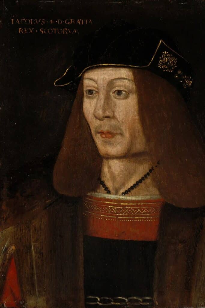 A painted portrait of James IV of Scotland, wearing a black hat with gold embroidery and a red and gold robe, who supported Perkin Warbeck’s claim to the English throne in the late 15th century.