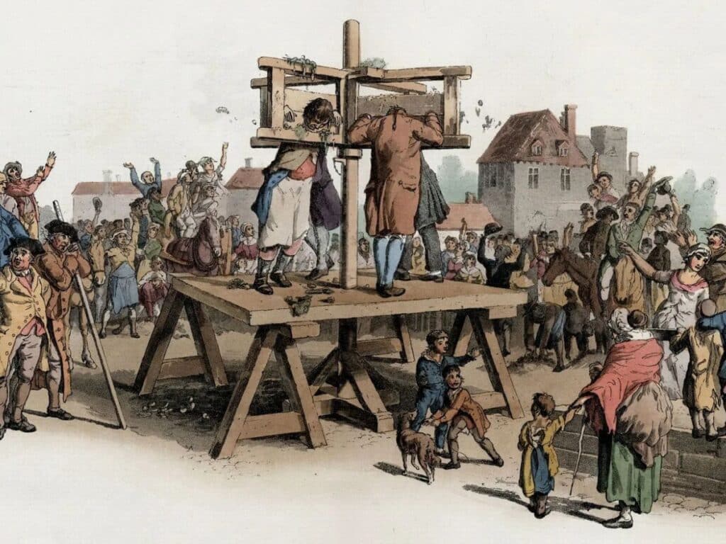 A bustling medieval crowd gathers for a public execution near a gallows, complete with vendors, children, and onlookers, demonstrating how death sentences were not just punishment but social events in the Middle Ages.