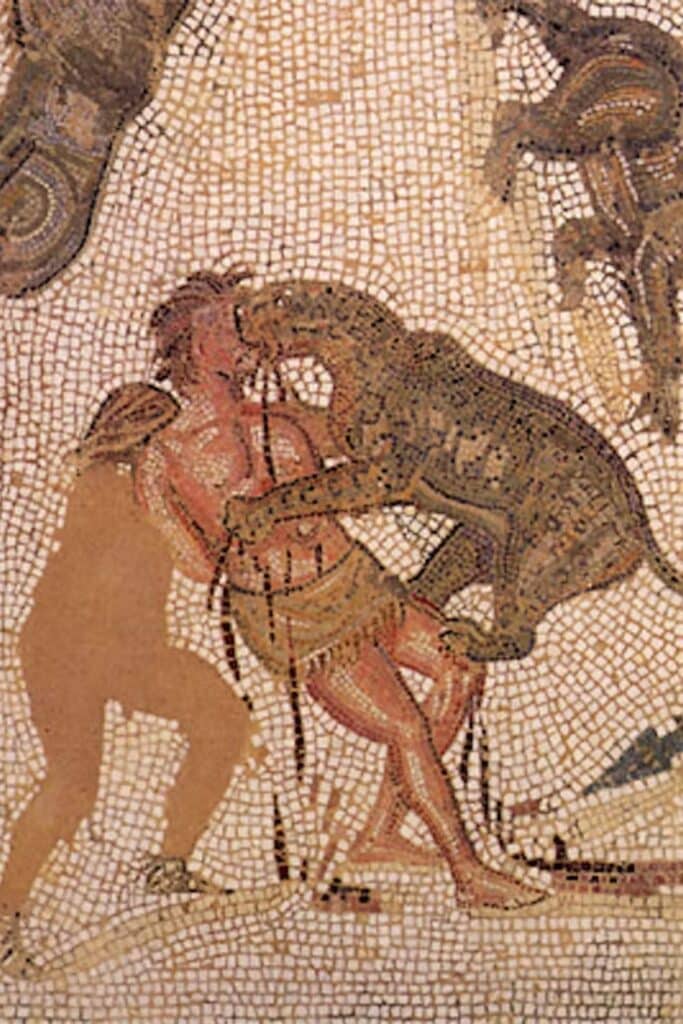 A Roman-style mosaic shows a man being mauled by a leopard in an arena setting, illustrating how being thrown to wild animals was a violent and terrifying way to die, even continuing into medieval spectacles.