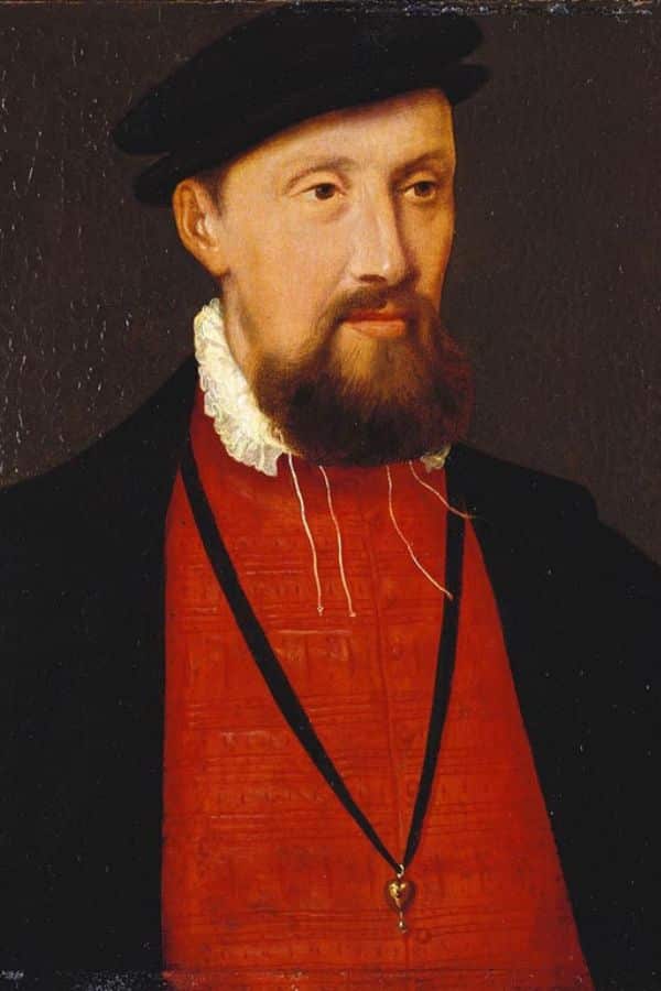 A Renaissance-era portrait of a bearded man in a red doublet and black hat, possibly depicting a noble associated with Margaret Tudor’s court or lineage.