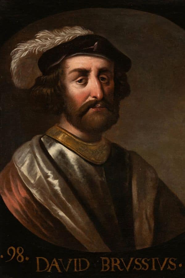 A painted portrait of a solemn man labeled “David Brvssivs,” wearing a feathered cap, gold-trimmed tunic, and fur-lined cloak, set against a dark background. David II of Scotland, husband of Joan of the Tower, is depicted with a somber expression and stylized hair and beard.