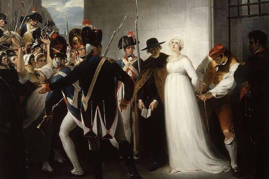 A painting depicting Marie Antoinette being led to execution in a white dress, flanked by soldiers and a priest. The emotional tension reflects the fear and dignity during the last days of Marie Antoinette.