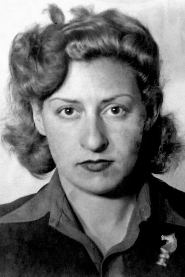Portrait of a young woman in WWII uniform with curled blonde hair, one of the female agents connected to Vera Atkins and the British Special Operations Executive.
