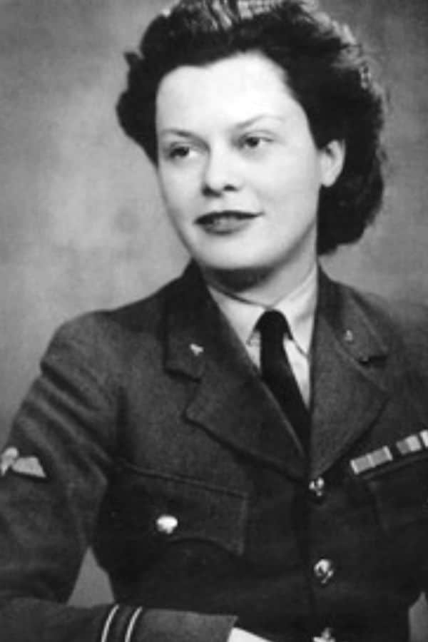 Formal WWII portrait of a woman in decorated military uniform, part of the female espionage network overseen by Vera Atkins.