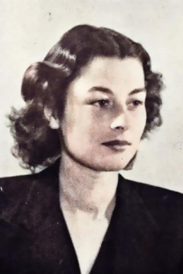 A colorized portrait of Violette Szabo in a dark jacket shows her composed and determined expression. This iconic photo represents the enduring legacy of Violette Szabo as a Special Operations Executive agent.
