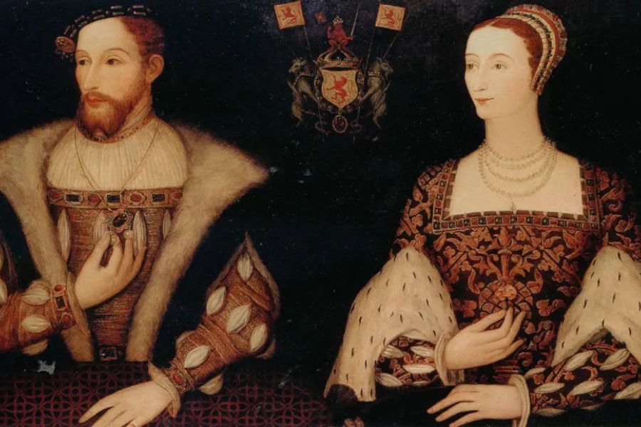 Formal portrait of a king and queen dressed in richly embroidered royal clothing with fur trimmed sleeves and layered jewelry against a dark background. The painting represents the influence and status of Scottish queens within royal dynasties.