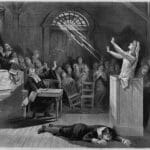 A black and white engraving shows a dramatic Salem Witch Trials courtroom scene. A distressed woman stands at a pulpit as spectral streaks point toward her while judges. guards. spectators. and a collapsed figure react around her.