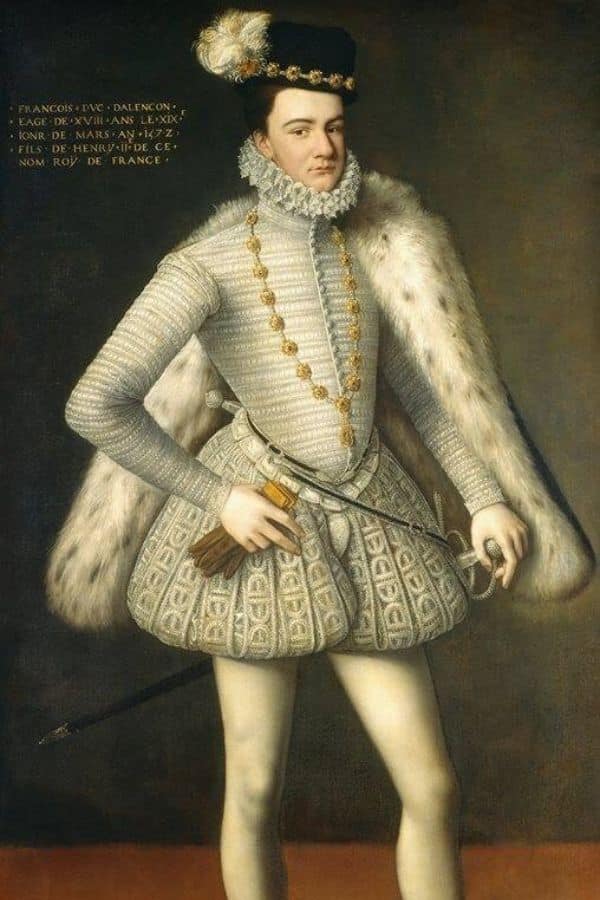 Portrait of a young nobleman in a pale embroidered doublet with a fur lined cloak and feathered cap. The painted inscription reads "Francois Duc Dalencon" and identifies him as a French royal figure connected to the Elizabeth I era.