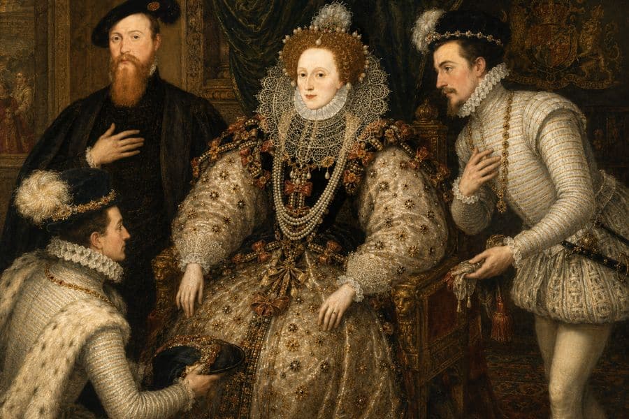 Elizabeth I sits in an ornate jeweled gown with a large lace collar while three richly dressed men attend her. Two men in pale court dress kneel and stand close to her throne while another man in black stands behind her with one hand on his chest.