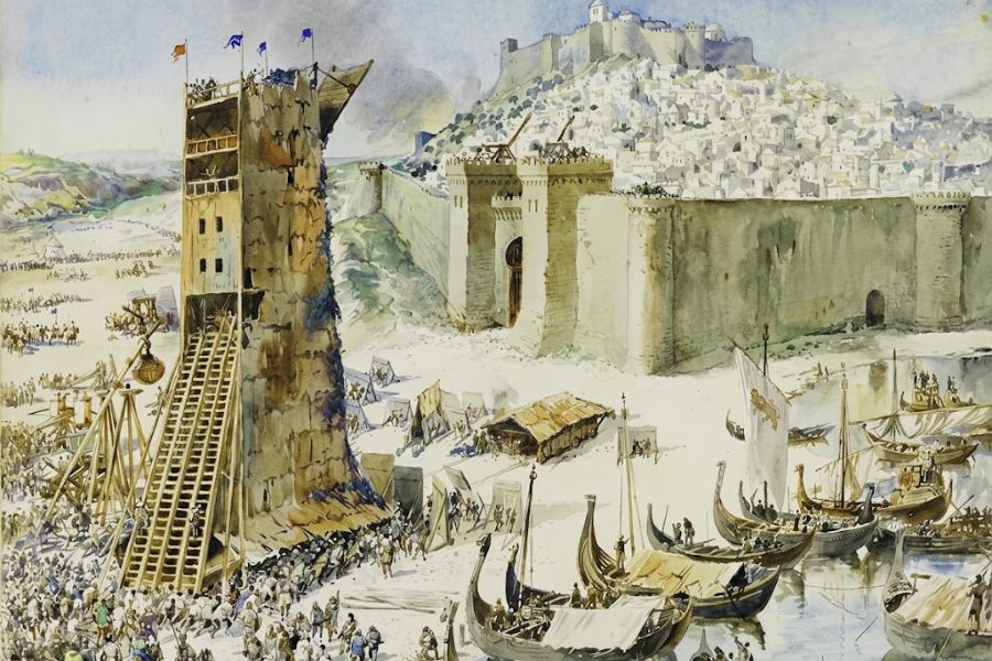 A fortified coastal city under attack with a tall wooden siege tower pressed against the walls and crowds of soldiers gathered below. Ships fill the harbor beside the defenses and a castle rises above the hillside city in this depiction of medieval sieges.